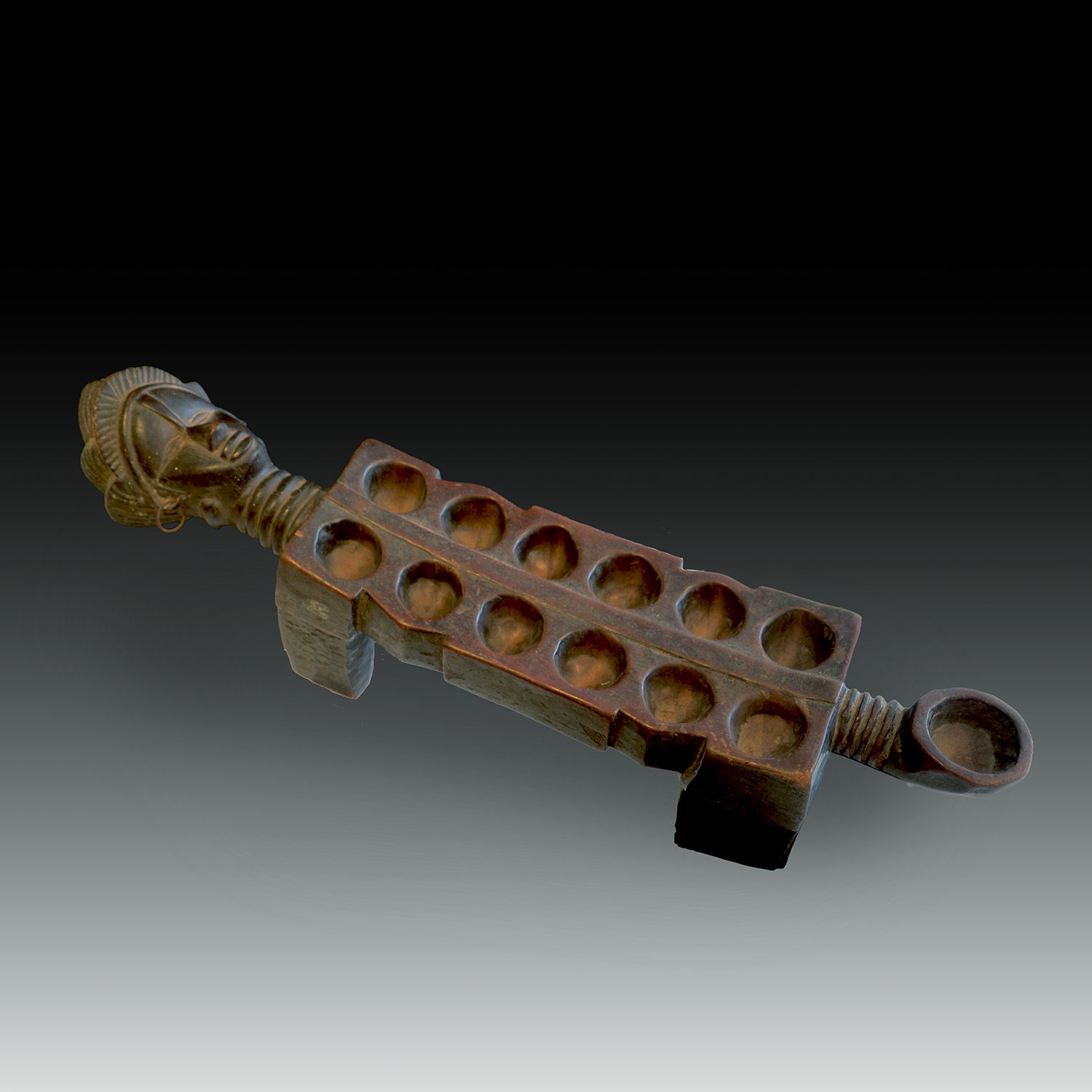 Dan Awele game board